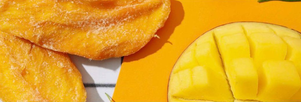 Dried mango slices and fresh mango